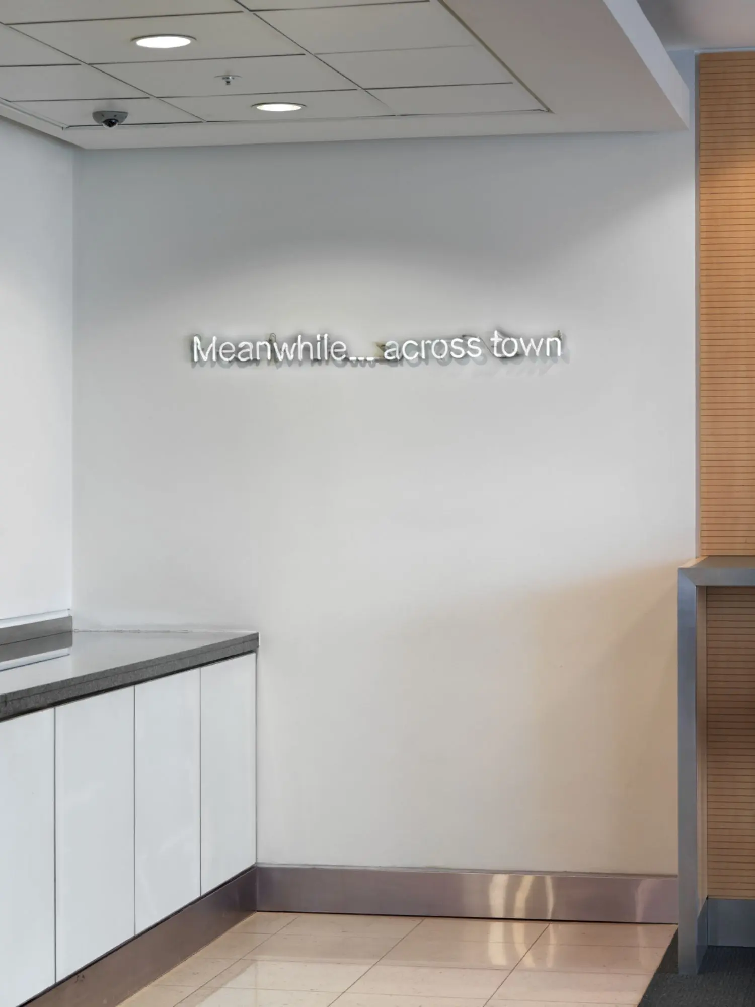 evans-cw-KL1688-b-meanwhile-across-town