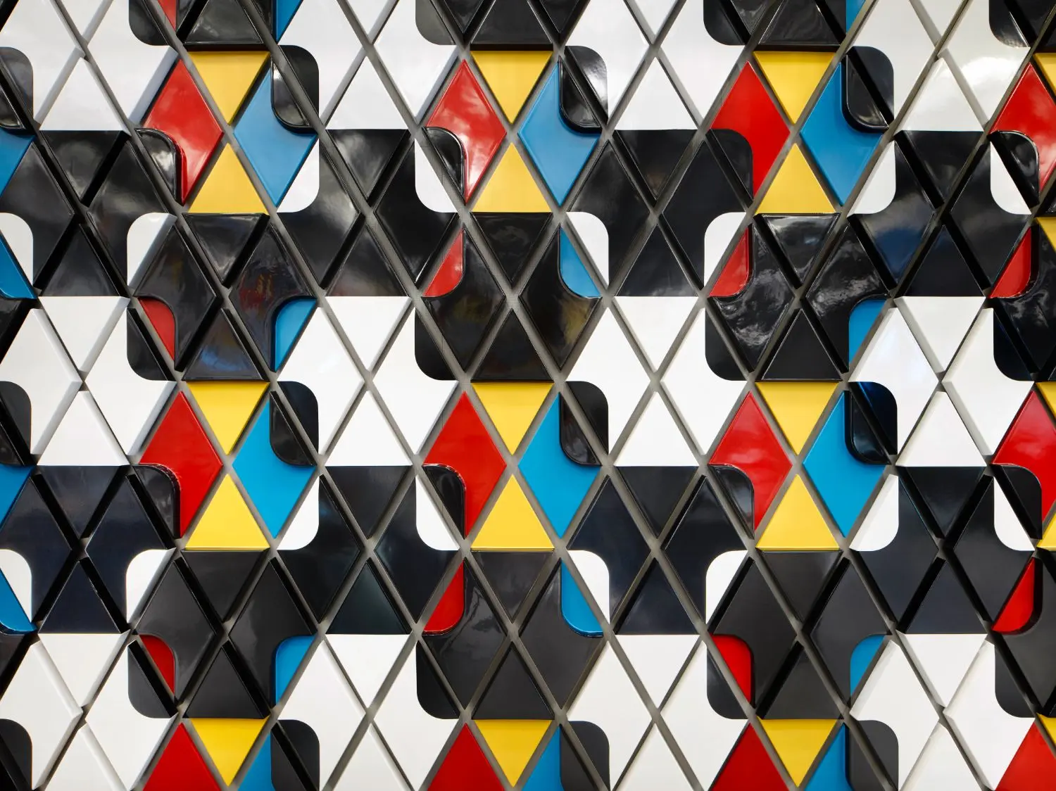 As the installation progresses downward, the colors increase in saturation.