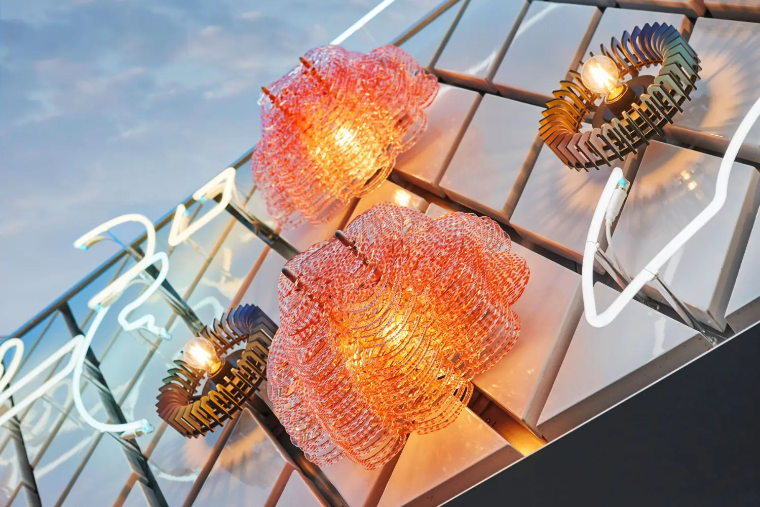 "Lights Patio" were a collaborative effort on the part of Pae White, Jorge Pardo and Tobias Rehberger. 