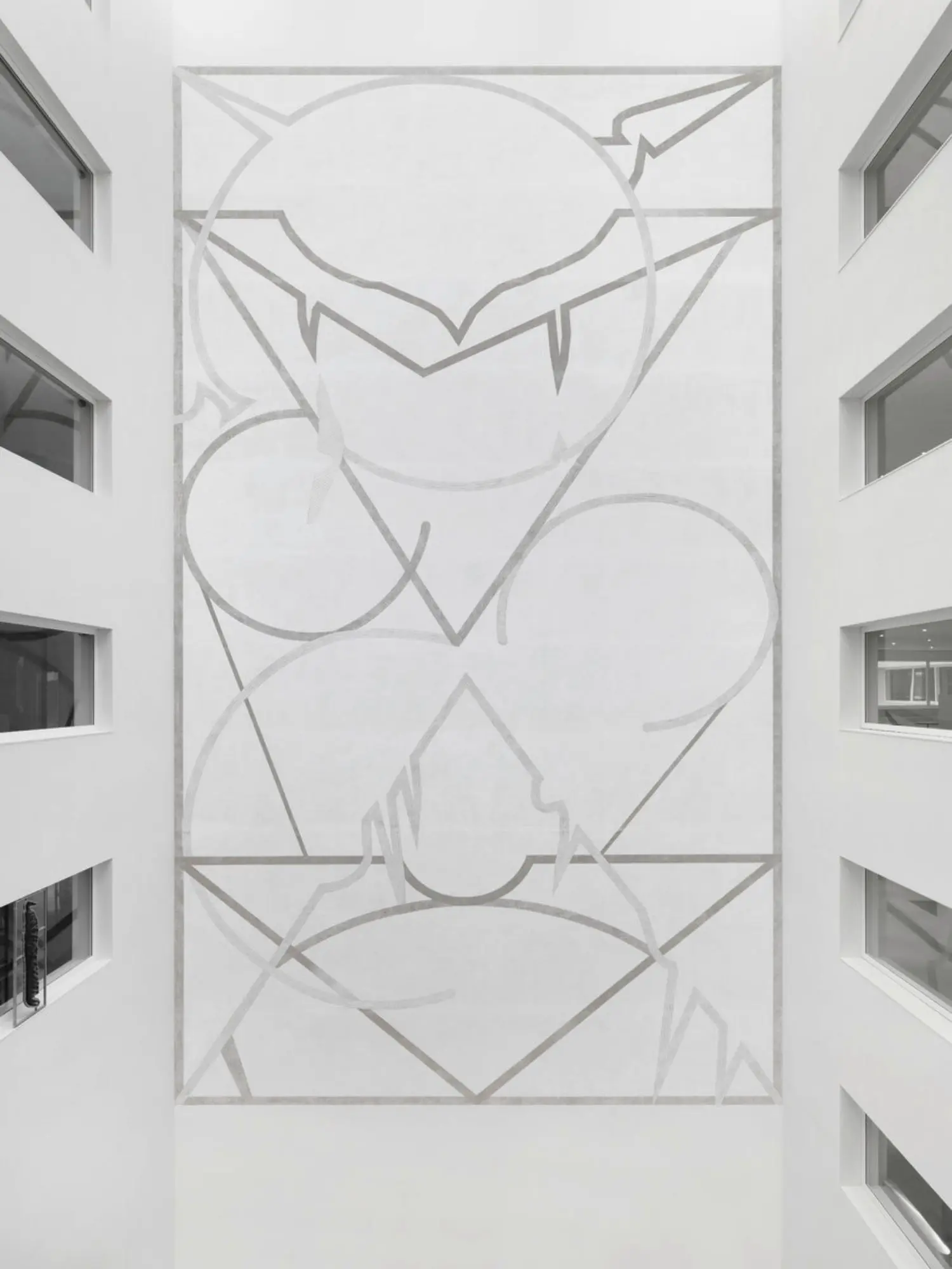 Standing alone like this, it becomes a kind of mask, an abstract face.