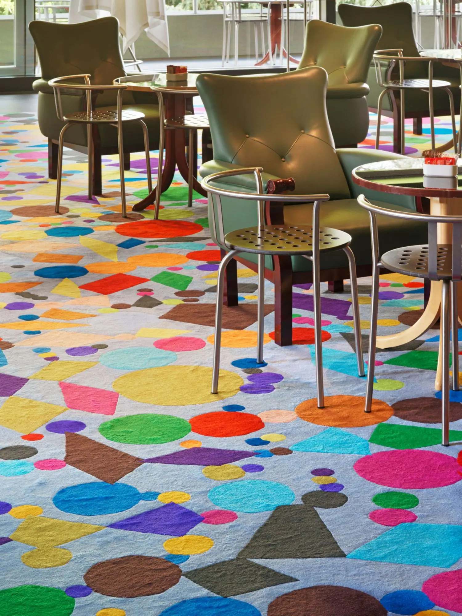 Austrian artist is using vibrant colour combinations that include orange, green and purple.