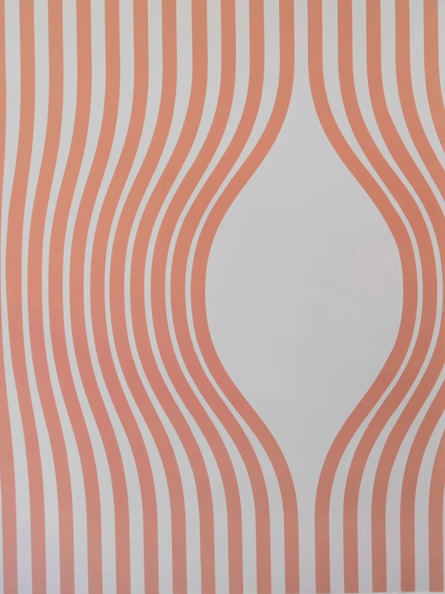 A light sculpture in the unusual shape of a large clump of giant crystals, inside which glow red, yellow, green and blue colours.