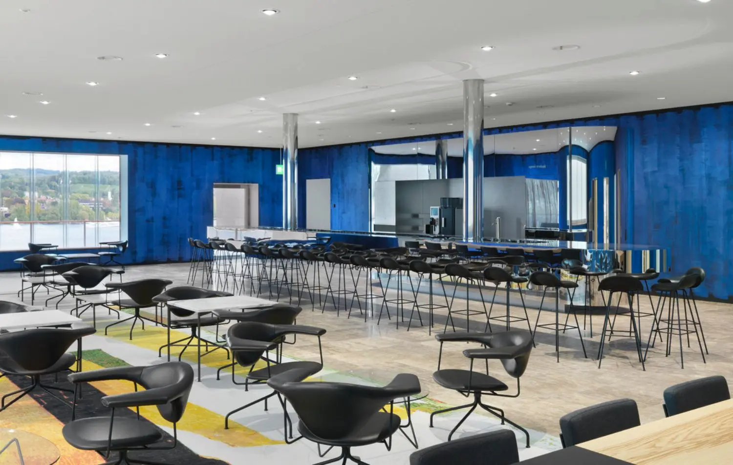 Floating just above floor level and seemingly defying the laws of gravity, the visibly heavy bar also has a shimmering and airy quality thanks to its polished surface.