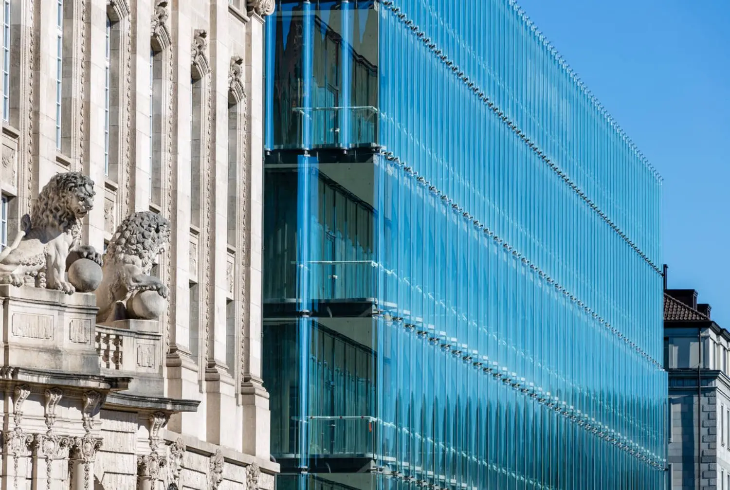 The Swiss Re Next building with its distinctive glass front.