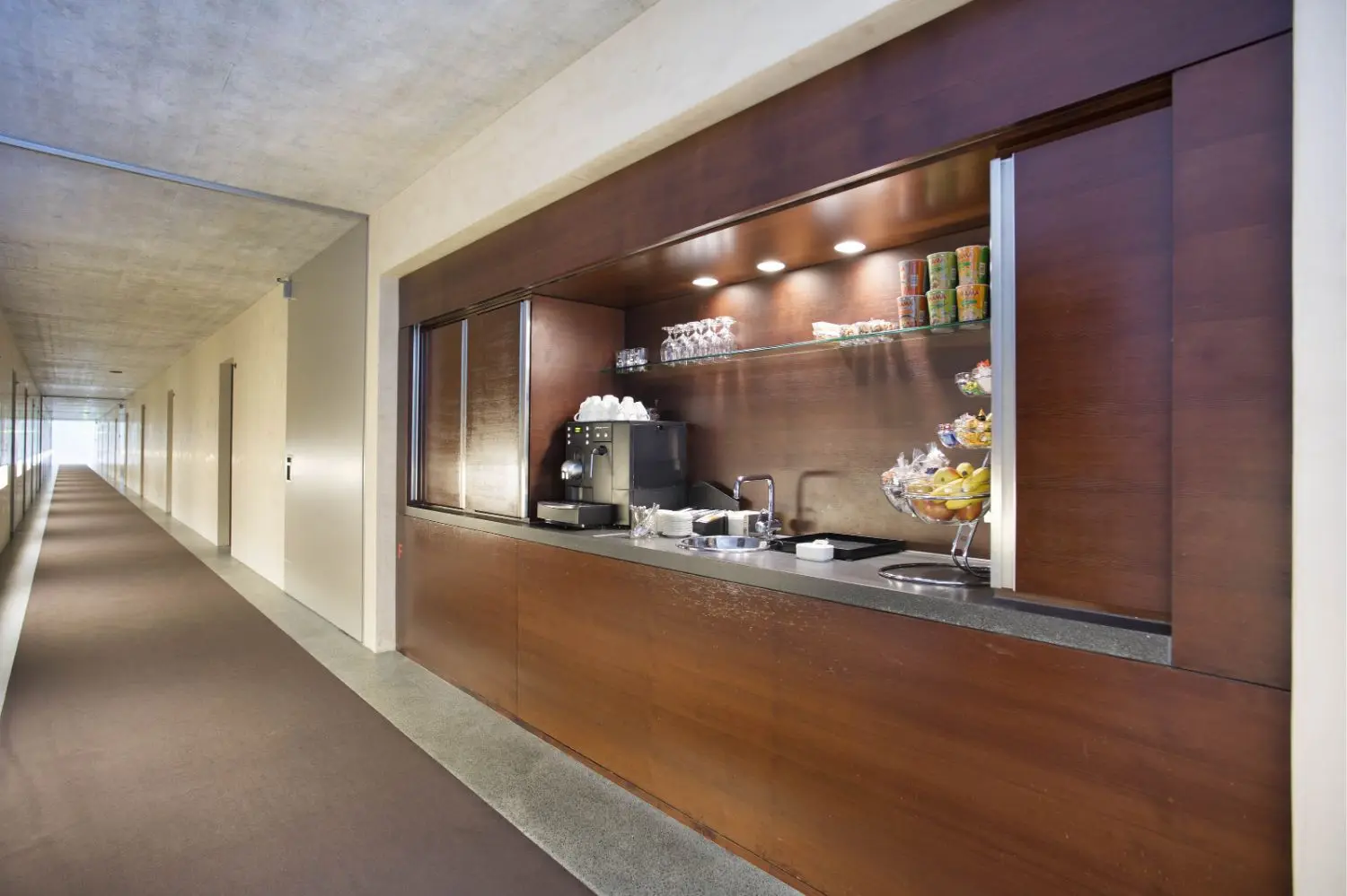 A wood-paneled snack area in a hotel hallway.