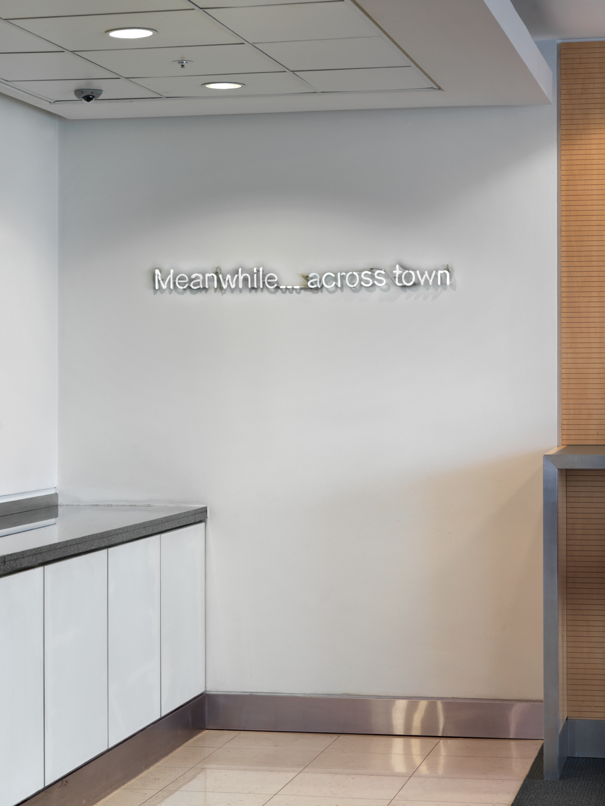 evans-cw-KL1688-b-meanwhile-across-town